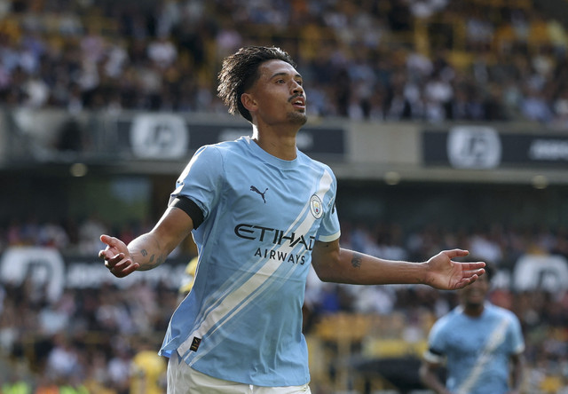 Tijjani Reijnders dari Manchester City merayakan gol kedua mereka pada pertandingan Liga Inggris antara Wolverhampton Wanderers vs Manchester City di Stadion Molineux, Wolverhampton, Britania Raya, Sabtu (16/8/2025). Foto: Paul Childs/REUTERS