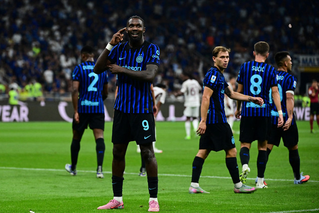 Selebrasi pemain Inter Milan Marcus Thuram usai mencetak gol. Foto: Piero CRUCIATTI / AFP