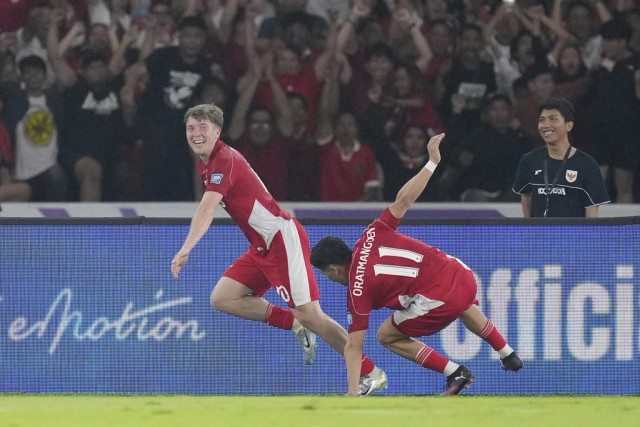 Ilustrasi syarat Timnas Indonesia untuk lolos Piala Dunia 2026. Foto: Tatan Syuflana/AP Photo