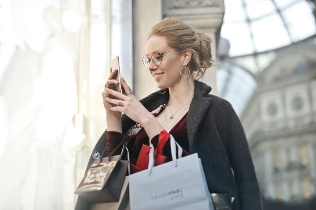 Photo by Andrea Piacquadio: https://www.pexels.com/photo/woman-standing-near-wall-holding-phone-994197/