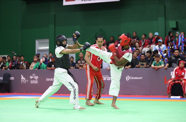 Pertandingan tarung derajat di PON Bela Diri 2025, Djarum Arena, Kudus. Foto: Dok. PON Bela Diri Kudus 2025