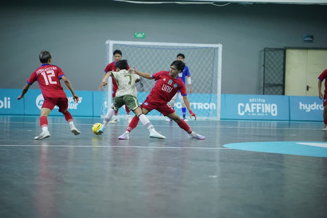 Laga semifinal Futsal Campus League Regional Yogyakarta antara UNY melawan UII, Selasa (11/11). Foto: Dok. Campus League