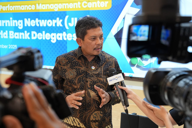 Direktur Utama BPJS Kesehatan, Ghufron Mukti saat menerima kunjungan perwakilan lebih dari 20 negara di dunia yang tergabung dalam Joint Learning Network (JLN) dan utusan World Bank, Jumat (14/11). Foto: Dok. BPJS Kesehatan