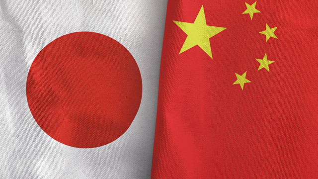 Ilustrasi bendera Jepan dan China. Foto: NINA IMAGES/Shutterstock