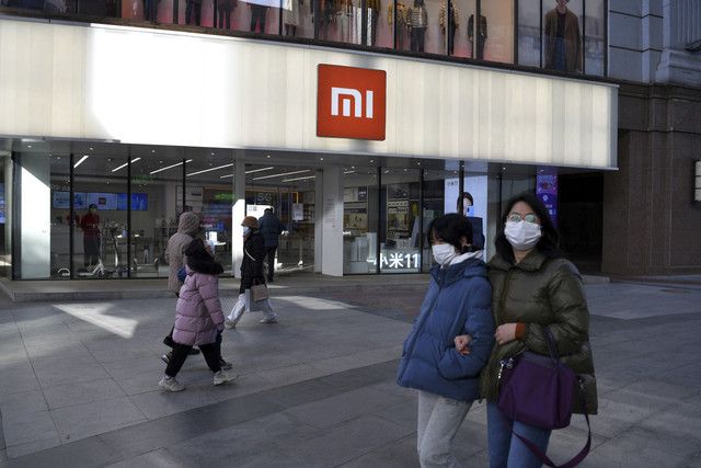 Ilustrasi Xiaomi. Foto: Greg Baker/AFP