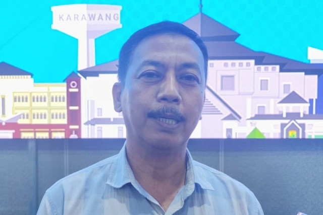 Kepala Disdikpora Karawang, Wawan Setiawan. Foto: Dok. Istimewa