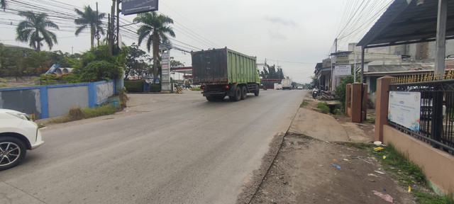 Lokasi Arifianti (41 tahun), guru SD swasta di Depok, ditemukan tewas di Jalan Raya Tlajung Udik, Gunung Putri, Kabupaten Bogor. Foto: kumparan