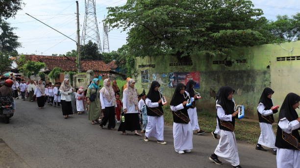 Penduduk desa Muslim merayakan peringatan agama Islam Foto by Istock