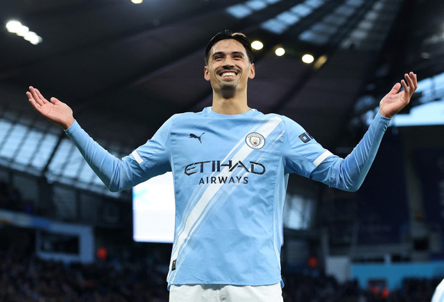 Selebrasi Tijjani Reijnders saat Man City vs West Ham dalam laga pekan ke-17 Liga Inggris 2025/26 di Stadion Etihad, Sabtu (20/12). Foto: Action Images via Reuters/Andrew Boyers