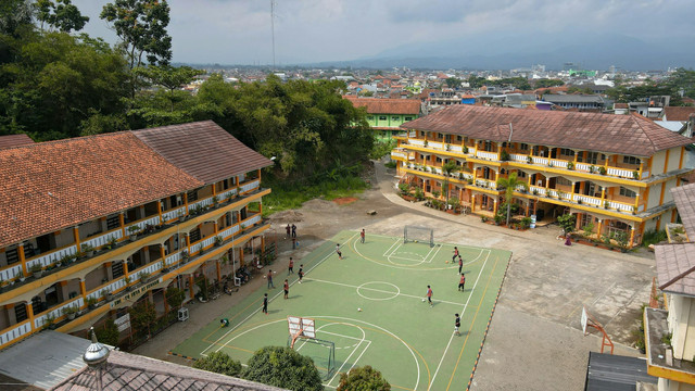 Ilustrasi gedung sekolah. Foto: Unsplash