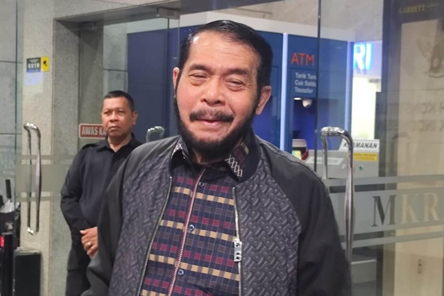 Hakim Konstitusi Anwar Usman memberikan keterangan pers di Kantor MK, Jakarta, Rabu (21/1/2026). Foto: Luthfi Humam/kumparan