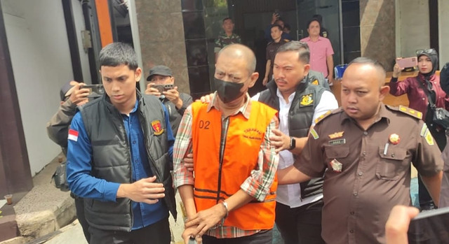 Gerry Imam Sutrisno saat digiring ke tahanan. Dok: SukabumiUpdate.com