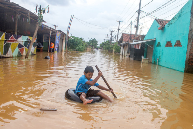 Banjir Salah Satu Akibat Kerusakan Lingkungan (Foto: M Ibnu Chazar/ANTARA FOTO)