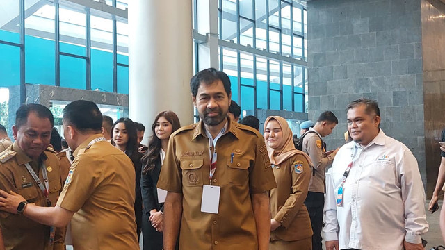 Gubernur Aceh Muzakir Manaf saat tiba di Rakornas Pemerintah Pusat dan Daerah 2026, Senin (2/2/2026), di SICC Sentul.  Foto: Nabila Ulfa/kumparan