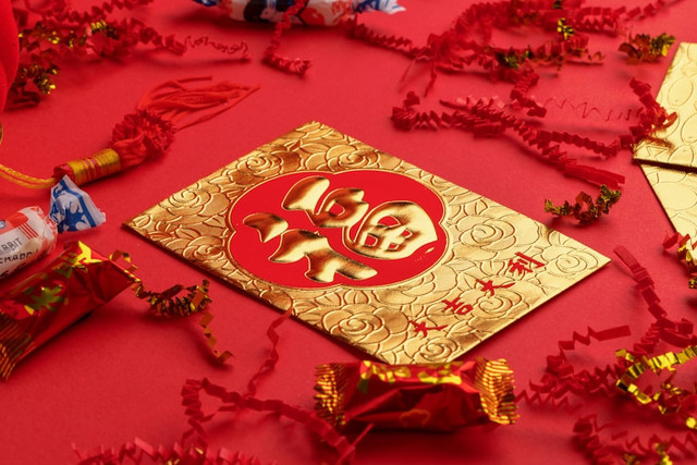 Ilustrasi Ucapan Xin Nian Kuai Le Imlek 2026. Unsplash.com/Jason Leung