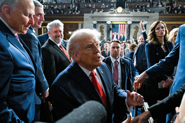 Presiden AS Donald Trump menyampaikan pidato kenegaraan di Gedung Capitol AS di Washington DC. Foto: Kenny Holston/The New York Times/HO via Reuters