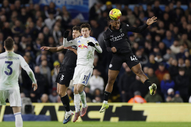 Leeds vs Man City di Liga Inggris. Foto: Jason Cairnduff/REUTERS