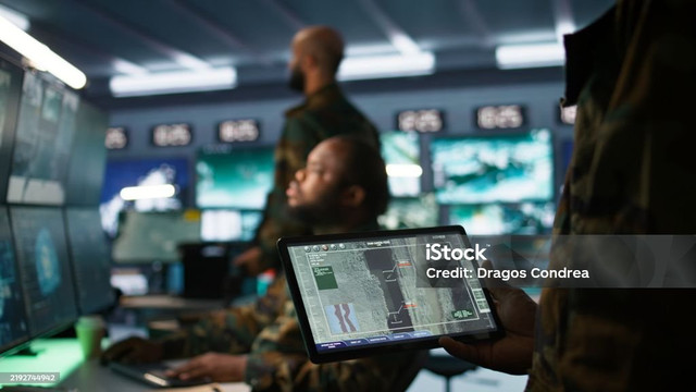 Sumber: https://www.istockphoto.com/en/photo/army-professional-employing-ai-tech-to-improve-military-combat-systems-gm2192744942-611013191