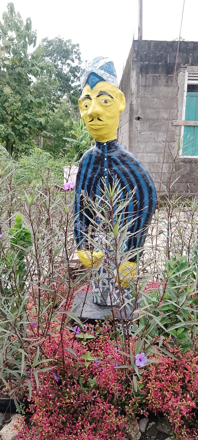 Foto: Patung "Abdi Dalem" Karya Raden Wedana Laksitowandowo (abdi dalem Keraton Yogyakarta). Sumber: Dokumen Penulis