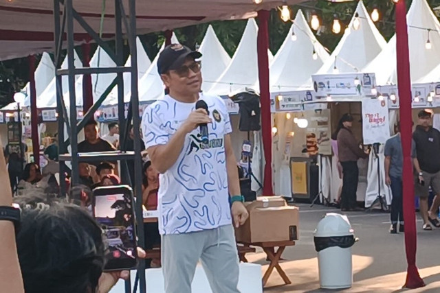 Menko Bidang Pemberdayaan Masyarakat Abdul Muhaimin Iskandar atau Cak Imin membuka Festival Jajak Jajanan Nusantara di kawasan Gelora Bung Karno, Jakarta, Minggu (8/3/2026). Foto: Zamachsyari/kumparan