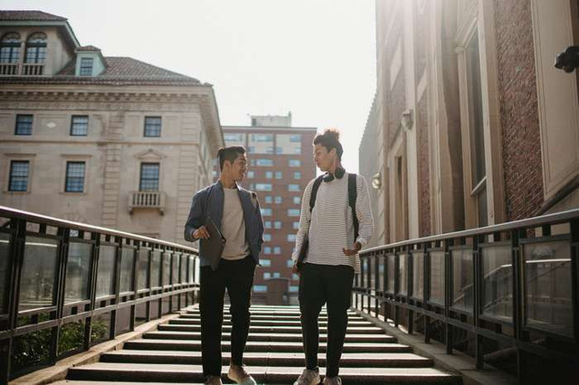 Photo by Armin Rimoldi from Pexels: https://www.pexels.com/photo/stylish-positive-diverse-friends-walking-downstairs-in-campus-5553035/