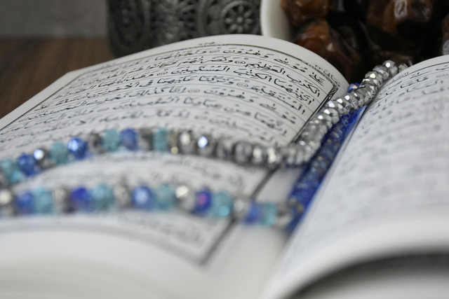 Photo by khats cassim: https://www.pexels.com/photo/close-up-shot-of-a-quran-7449225/