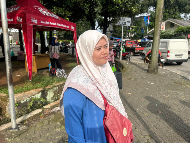 Umu Aqila (43), warga Ciracas yang mudik ke Majalengka, Jawa Barat. Foto: Nauval Pratama/kumparan