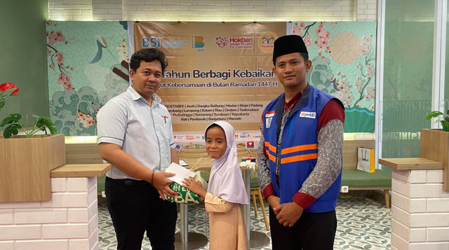 Santunan Anak Yatim Berhasil digelar oleh DT Peduli yang berkolaborasi dengan HokBen Riau (Sumber : DT Peduli)
