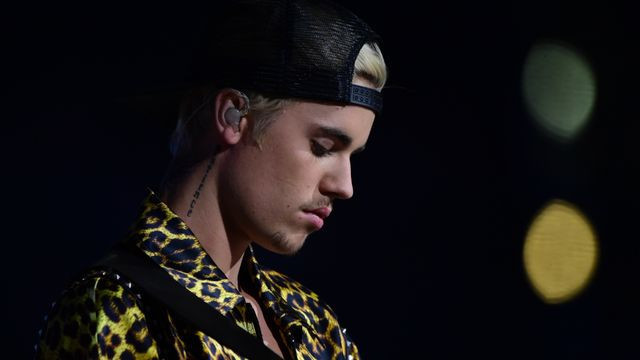 Ilustrasi Lirik Lagu That Should Be Me, Foto: ROBYN BECK / AFP/kumparanHITS