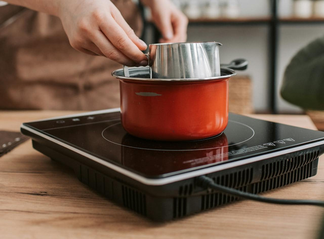 Ilustrasi kompor listrik portable low watt. Foto: Pexels