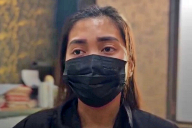 Inge Marita (28), warga Perumahan Pulorejo Green Modern, Pulorejo, Kota Mojokerto, yang ditetapkan tersangka usai aksinya memaki dan menoyor anak SD saat cekcok di Jalan Empunala, Kota Mojokerto. Foto: Dok. Istimewa