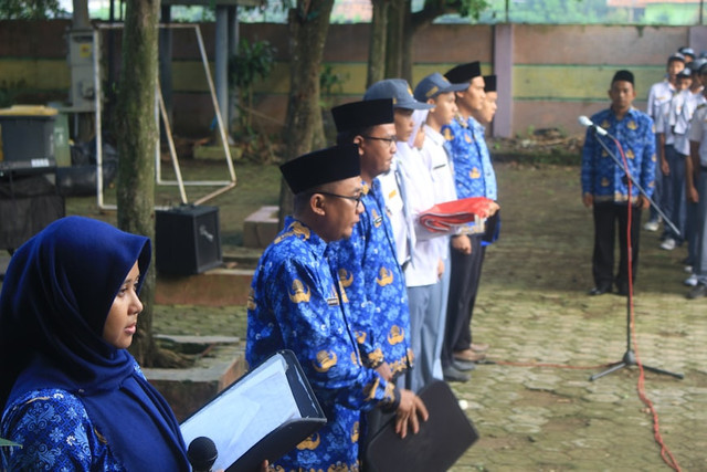 Ilustrasi Naskah Amanat Pembina Upacara Hardiknas 2026, SMKN 1 Gantar