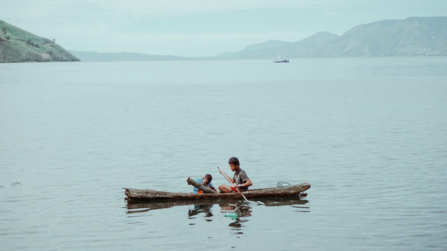 Ilustrasi Siapa yang Memegang Prinsip Sagu Sampan dan Sungai di Papua,Foto:Unsplash/Jesman fabio