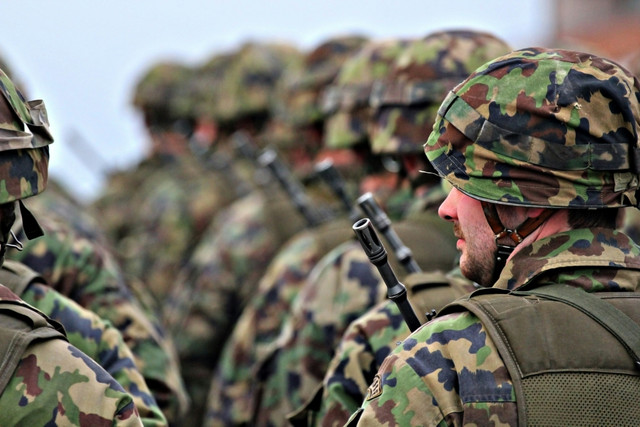 Ilustrasi tentara yang berbaris. Foto: Simon Infanger/Unsplash