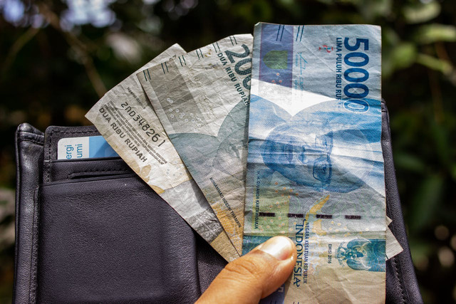 Ilustrasi dampak jika rupiah terus melemah terhadap dolar AS. Foto: Pexels