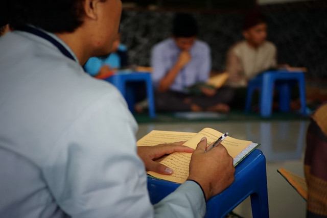 Ilustasi Bagaimana cara beriman kepada kitab-kitab sebelum Alquran. Foto: Unsplash/MATAQ Darul Ulum