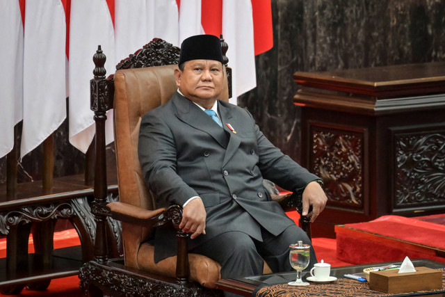 Presiden Prabowo Subianto bersiap menyampaikan pidato dalam Rapat Paripurna ke-19 DPR RI Masa Persidangan V Tahun Sidang 2025-2026 di kompleks Parlemen, Jakarta, Rabu (20/5/2026). Foto: Bay Ismoyo/AFP