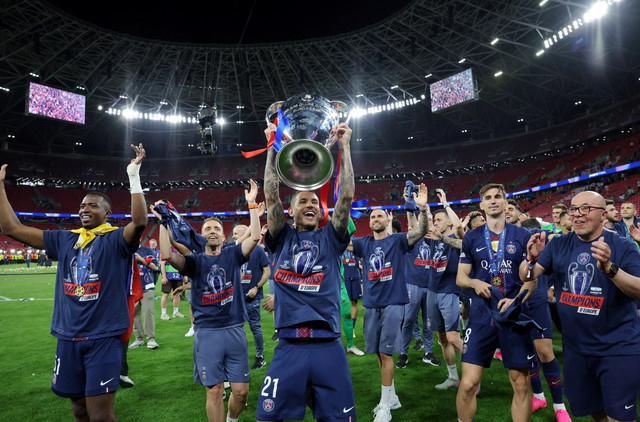 Pemain Paris Saint-Germain merayakan juara Liga Champions usai mengalahkan Arsenal di Puskas Arena, Budapest, Hongaria, Sabtu (30/5/2026). Foto: Bernadett Szabo/REUTERS