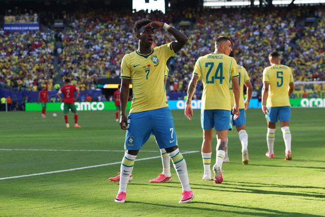 Selebrasi pemain Timnas Brasil Vinicius Junior usai mencetak gol ke gawang Timnas Maroko pada pertandingan Grup C Piala Dunia 2026 di New Jersey Stadium, East Rutherford, New Jersey, AS, Sabtu (13/6/2026). Foto: Vincent Carchietta/IMAGN IMAGES via REUTERS