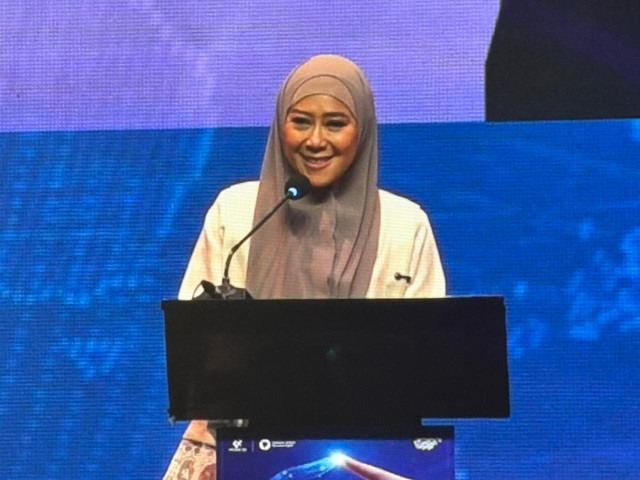 Menkomdigi, Meutya Hafid saat memberikan paparan dalam agenda deklarasi DEAL 2026 di The Tribata, Jakarta Selatan, Selasa (23/6). Foto: Ryan Iqbal/kumparan
