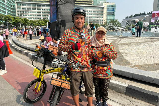 Taslim dan Yuli, warga Kunciran Indah Tangerang saat ditemui di Bundaran HI, Jakarta Pusat, Minggu (28/6/2026). Foto: Nauval Pratama/kumparan