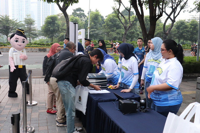 Kantor Imigrasi Kelas I Khusus Non TPI Jakarta Barat menghadirkan layanan Pasporia (Paspor Minggu Ceria) pada kegiatan Car Free Day (CFD) di Wisma Keiai, Jakarta Pusat, Minggu (19/7/2026). Foto: Dok. Imigrasi Jakarta Barat