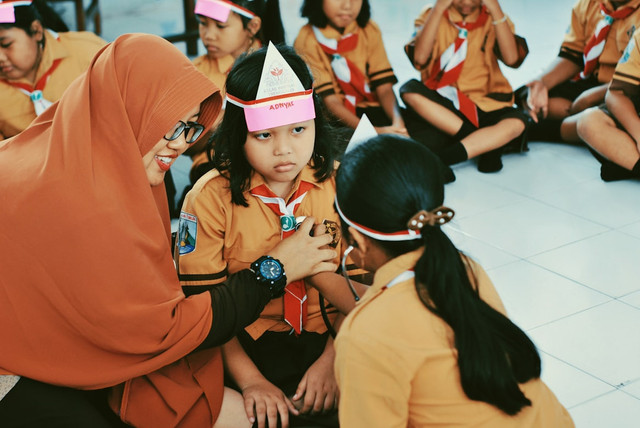 Ilustrasi Makna pramuka untuk negeri bagi seorang ASN. Foto: Unsplash.com/Husniati Salma