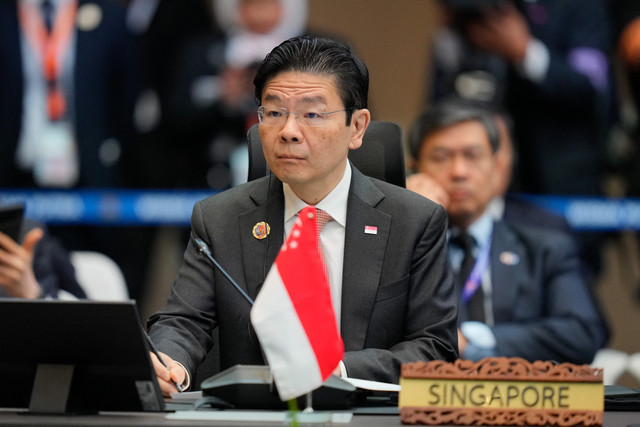 Perdana Menteri Singapura Lawrence Wong. Foto: Vincent Thian/POOL/AFP