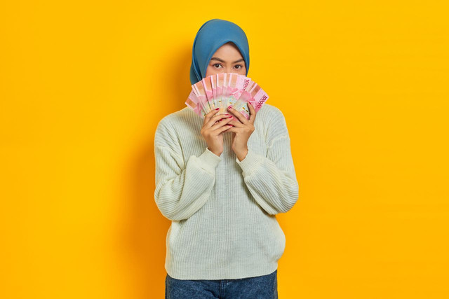 Ilustrasi membahas penebalan bansos 2026 kapan cair. Foto: Pexels