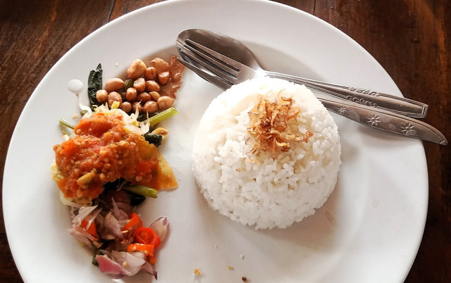 Ilustrasi Kenapa Nasi di Rice Cooker Bisa Kuning,Foto:Unsplash/Inna Safa