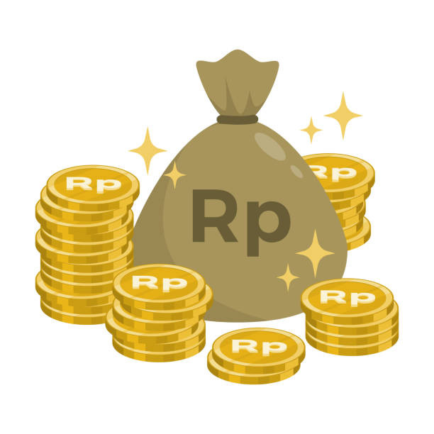 ilustrasi uang koin Rupiah berwarna emas. Foto: Ekatamadesign/iStock 