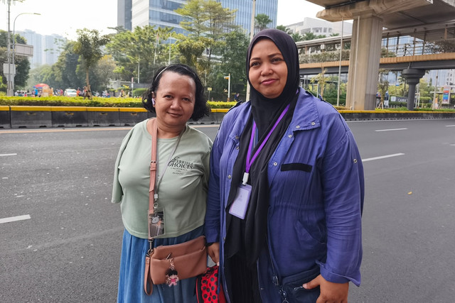 Ayu dan Ika, warga yang rutin melakukan aktivitas olahraga di Car Free Day (CFD), Kawasan HR Rasuna Said, Jakarta, Minggu (20/9/2026). Foto: Aditya Nugraha/kumparan