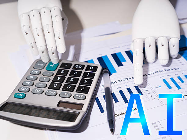 Ilustrasi: Kecerdasan buatan telah banyak digunakan dalam bisnis dan keuangan. Konsep tangan robot. Karya: in-future/iStock