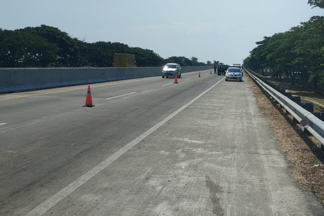 Lokasi Mobil Elf berpenumpang belasan suporter sepak bola PSS Sleman terlibat kecelakaan dengan truk muatan kayu di KM 616+200 jalur A, Tol Ngawi-Kertosono, masuk Desa Bajulan, Kecamatan Saradan, Kabupaten Madiun, Minggu (18/10/2026). Foto: Dok. Istimewa